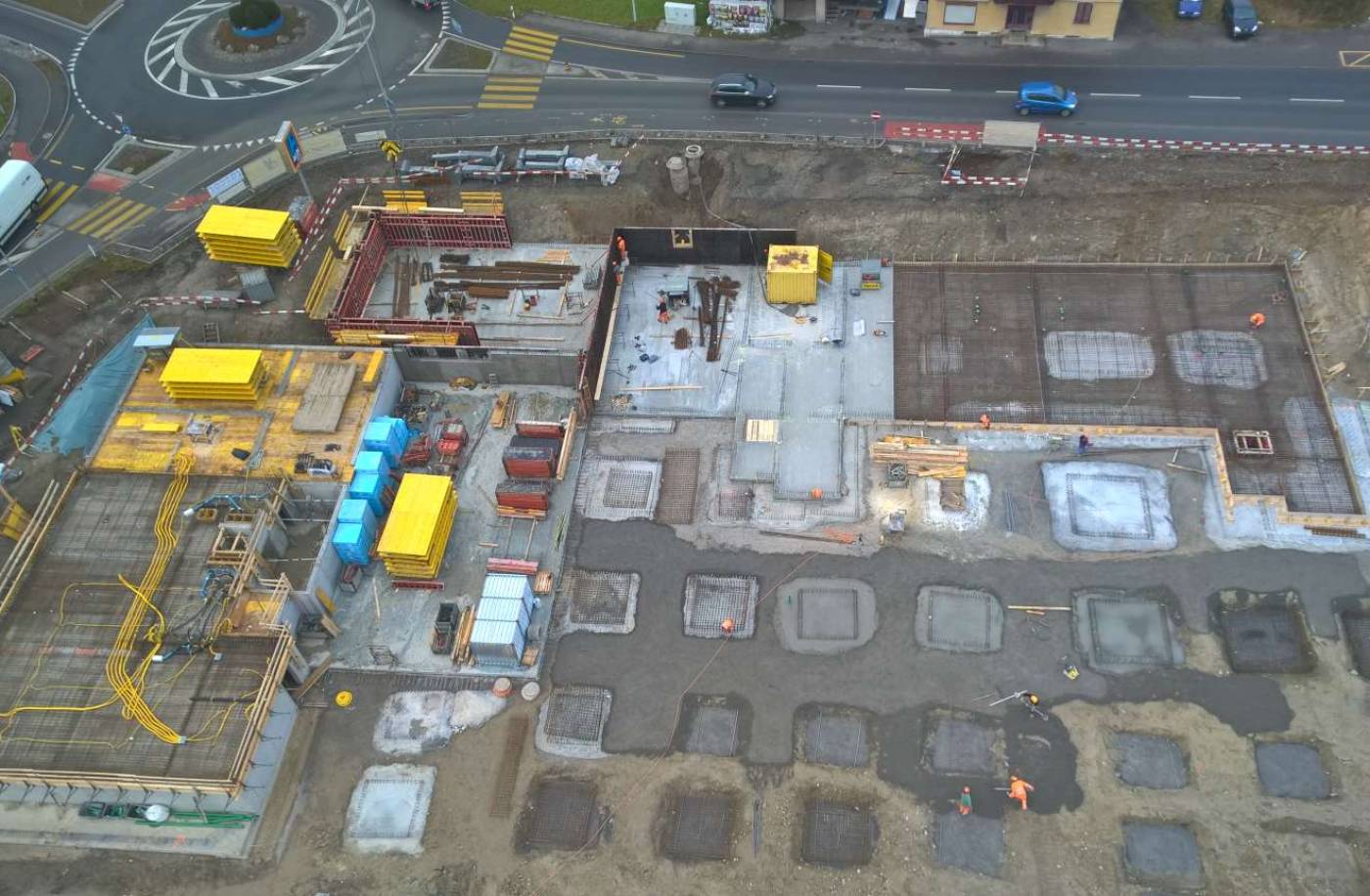 Wohn- und Gewerbegebäude Ortskern, Honau 1.Etappe, Baugrube, Baugrubensicherung, Werkleitung und Kanalisation, Tragwerksplanung, Baukontrollen