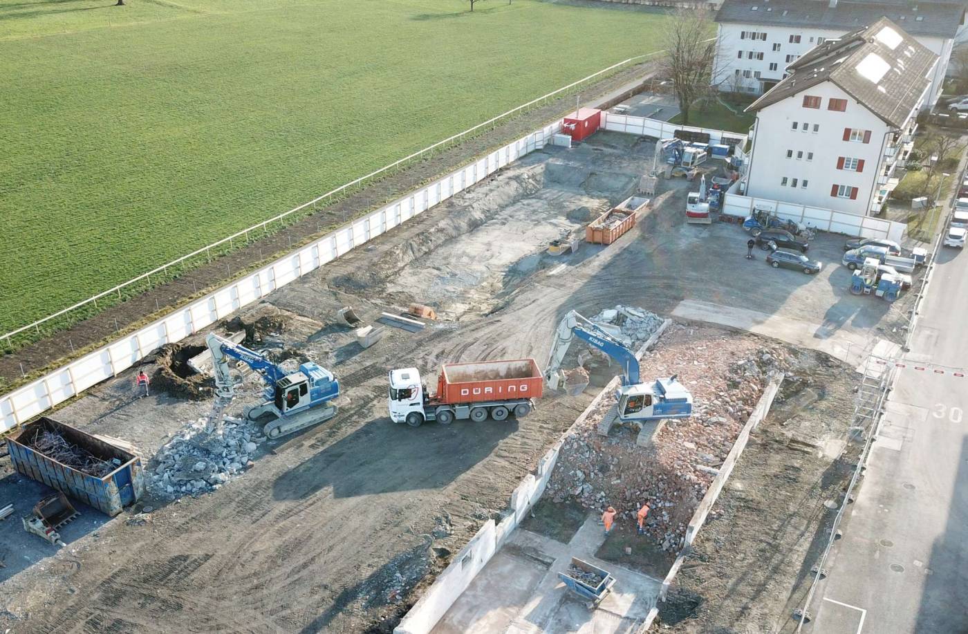 Überbauung Lauriedhofweg, Zug, Bestandesaufnahmen/Rissprotokolle, Geodätische Bauwerksüberwachungen, Piezometermessungen, Erschütterungsmessungen, Baubegleitende Vermessung, Baufixpunkte, Meterrisse